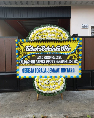 Papan Bunga Duka di Cipamokolan